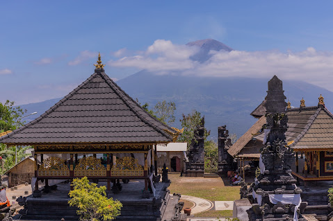 Situated on the slopes of Mount Lempuyang in East Bali, Lempuyang Temple is renowned for its breathtaking "Gates of Heaven." This sacred site offers stunning views of Mount Agung, providing a serene and spiritual experience for visitors. As one of Bali's oldest and most important temples, Lempuyang is a vital place of worship and part of the Sad Kahyangan, Bali’s six holiest temples. Visitors can enjoy a scenic journey to the temple and capture iconic photographs framed by the majestic gates, especially at sunrise. The temple’s peaceful atmosphere and panoramic views make it a must-visit for those seeking Bali’s cultural and spiritual essence.