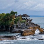 Located on a rocky outcrop in the Indian Ocean, Tanah Lot Temple is one of Bali's most iconic landmarks. Known for its dramatic setting and spiritual significance, this sea temple is a must-visit destination for travelers. Built in the 16th century, Tanah Lot is dedicated to the Balinese sea gods and is an important cultural site.